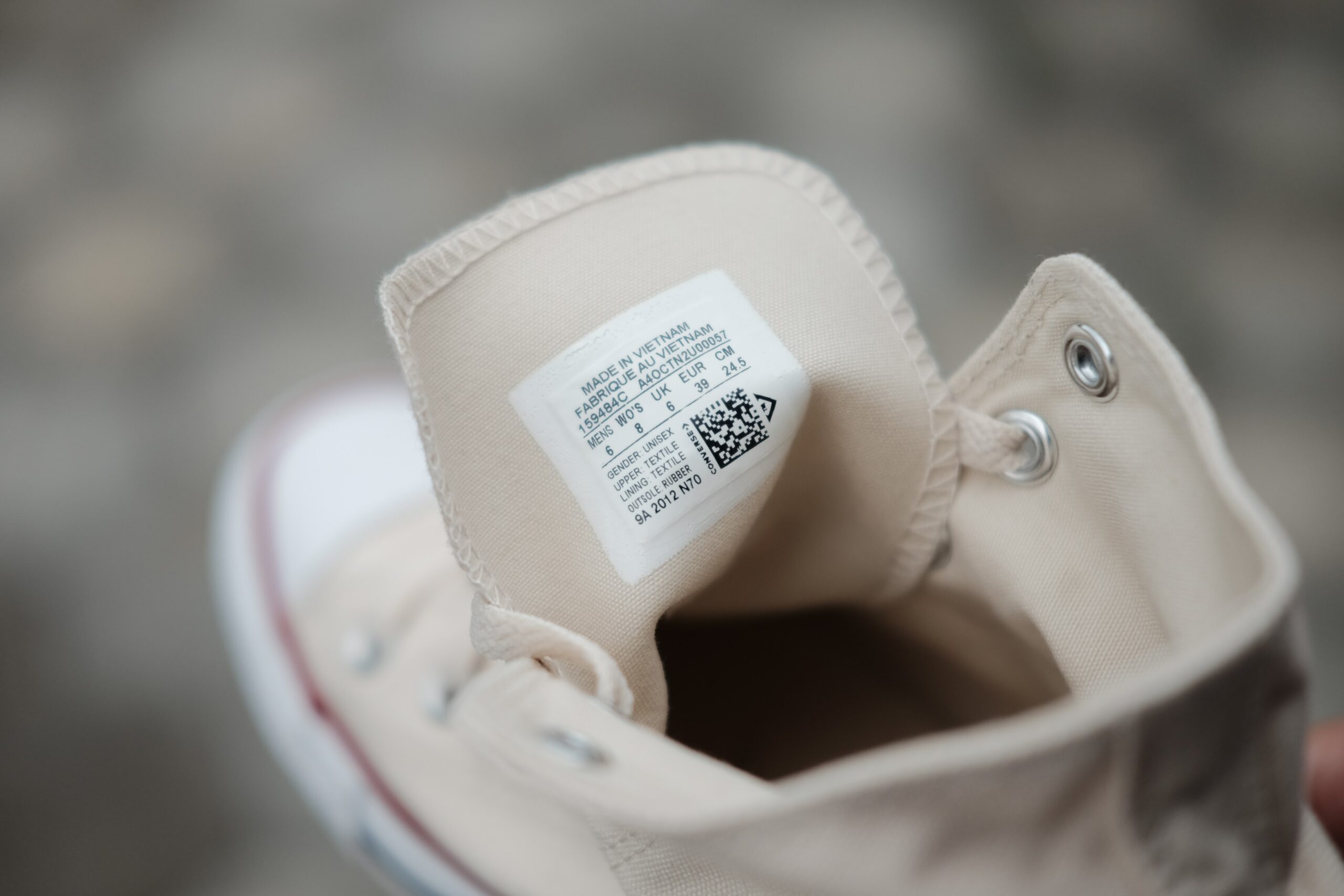 qr codes on clothing tags beige canvass shoe sneakers